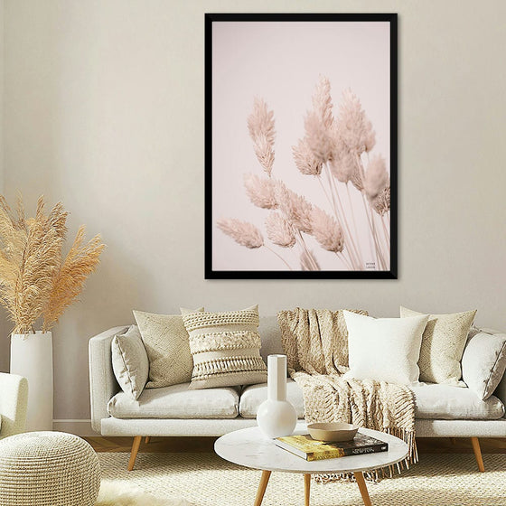 “Wistful Neutral” by Nathan Larson invites you into a serene world where nature’s whispers echo through delicate wisps of pampas grass. This exquisite print captures the ethereal grace of minimalist artistry—a soft, neutral palette that soothes the soul. Against a light pink backdrop, the grass dances, its feathery strands revealing stories of quiet beauty.