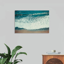  "Pacific Afternoon I" by Nathan Larson is a breathtaking aerial photograph that captures the serene beauty of the Pacific Ocean. The deep turquoise water, punctuated by rolling white waves, creates a mesmerizing and calming scene. The image evokes a sense of peace and tranquility, inviting the viewer to imagine themselves relaxing on a sandy beach and soaking up the sun. This limited edition print is perfect for adding a touch of coastal serenity to any home or office.