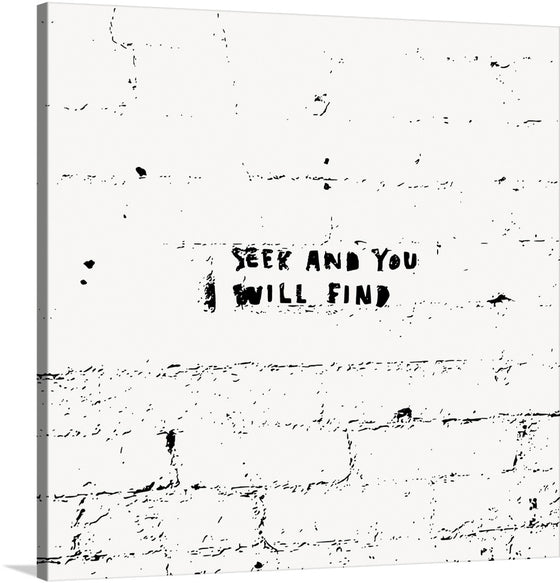 This minimalist artwork, available as a limited edition print, features the bold, black text “SEEK AND YOU WILL FIND” at its center. The stark contrast between the text and the pristine white background creates a profound simplicity. The text appears to be stamped or printed with an ink that has slightly bled, adding an artistic touch to the piece. 