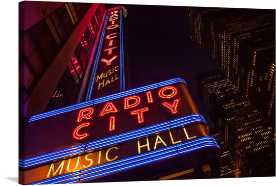 Immerse yourself in the vibrant energy of New York City with this exquisite print of the iconic Radio City Music Hall. Bathed in radiant neon lights, the artwork captures the essence of a city that never sleeps. Every line and curve of the famed marquee is brought to life, offering a visual symphony of color and illumination. 