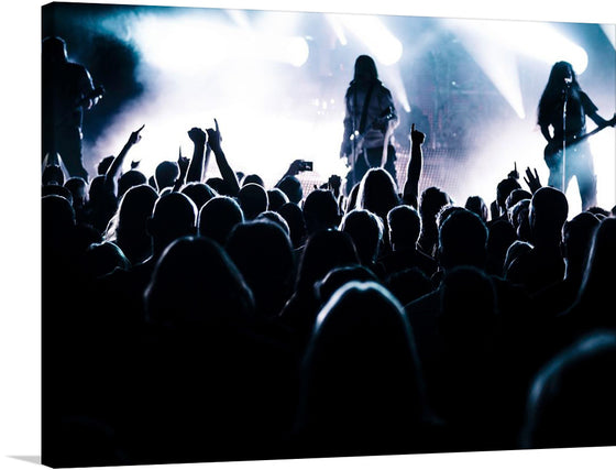 Immerse yourself in the electrifying atmosphere of a live concert with this stunning print. Every strand of hair, silhouette, and raised hand is captured with exquisite detail, bringing the raw energy and emotion of a live performance into your space. The contrasting play of lights and shadows immortalizes a moment where music and souls intertwine, making it a perfect piece for music enthusiasts looking to add a touch of rock 'n roll flair to their surroundings.