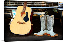  “Country boots and music” is a beautiful print that captures the essence of country music. The print features a guitar and a pair of cowboy boots in front of a vintage Cadillac. 