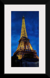 "Eiffel Tower Lit Up at Night"