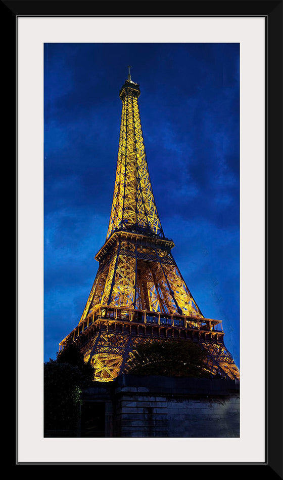 "Eiffel Tower Lit Up at Night"