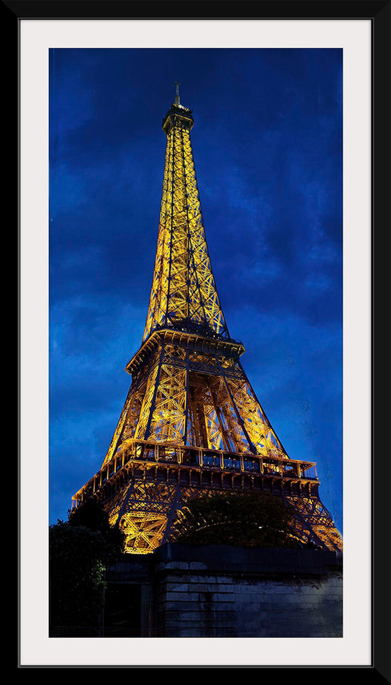 "Eiffel Tower Lit Up at Night"