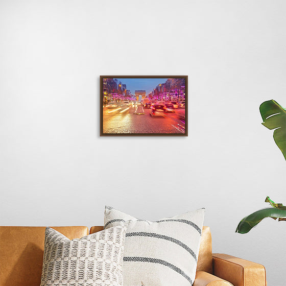 "Night view of Arc de Triomphe with vehicle light trails effect"