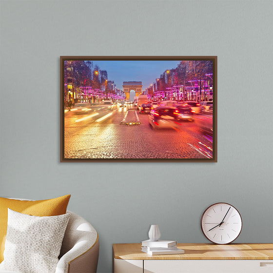 "Night view of Arc de Triomphe with vehicle light trails effect"