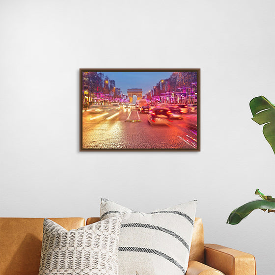 "Night view of Arc de Triomphe with vehicle light trails effect"