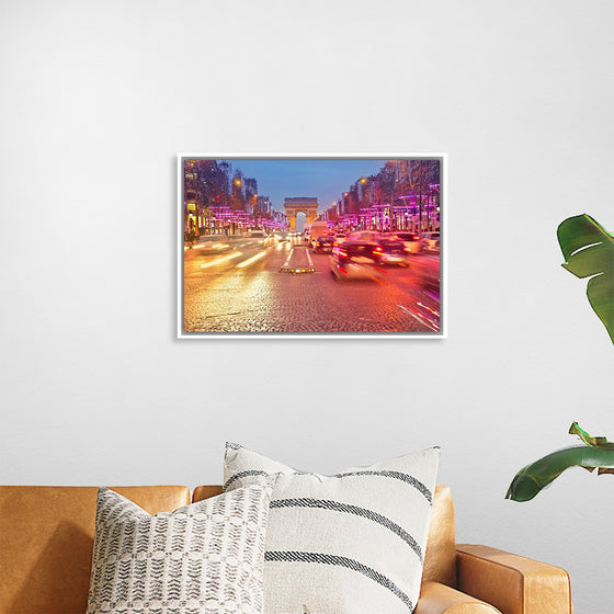 "Night view of Arc de Triomphe with vehicle light trails effect"