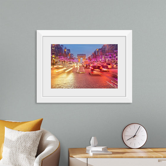 "Night view of Arc de Triomphe with vehicle light trails effect"