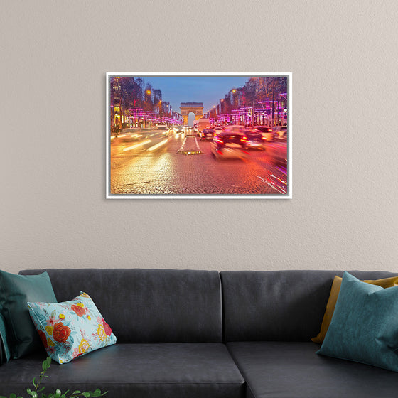 "Night view of Arc de Triomphe with vehicle light trails effect"