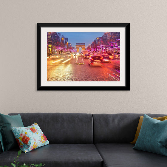 "Night view of Arc de Triomphe with vehicle light trails effect"