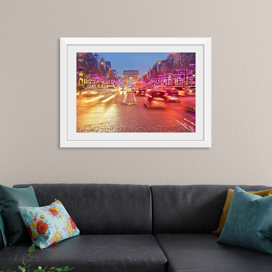 "Night view of Arc de Triomphe with vehicle light trails effect"