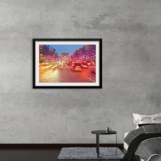 "Night view of Arc de Triomphe with vehicle light trails effect"