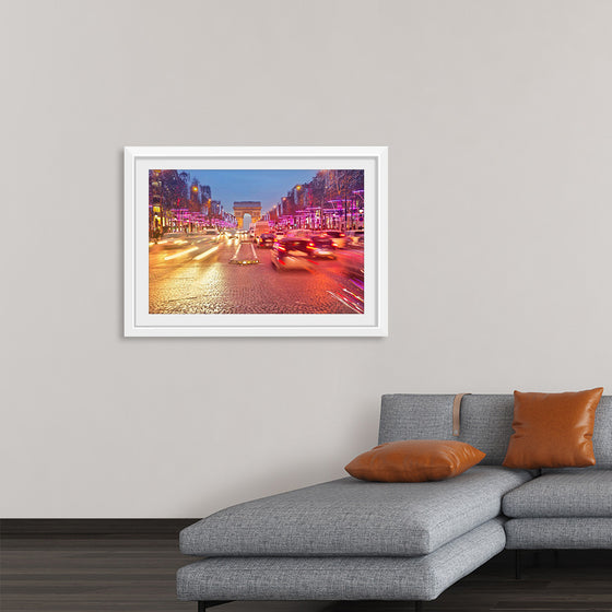 "Night view of Arc de Triomphe with vehicle light trails effect"