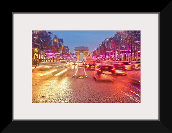 "Night view of Arc de Triomphe with vehicle light trails effect"