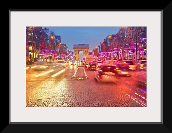 "Night view of Arc de Triomphe with vehicle light trails effect"