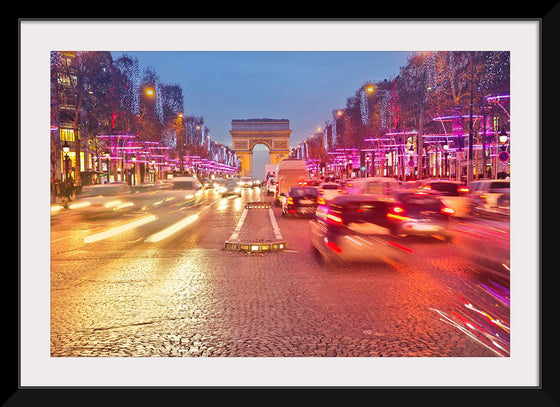 "Night view of Arc de Triomphe with vehicle light trails effect"