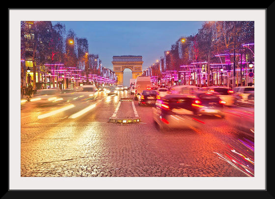 "Night view of Arc de Triomphe with vehicle light trails effect"