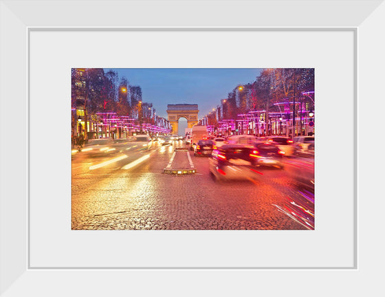 "Night view of Arc de Triomphe with vehicle light trails effect"