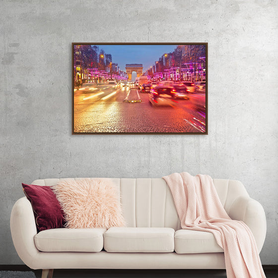 "Night view of Arc de Triomphe with vehicle light trails effect"