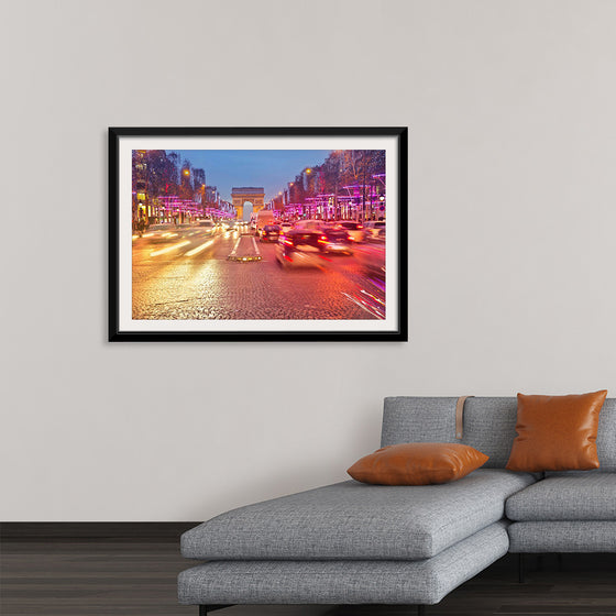 "Night view of Arc de Triomphe with vehicle light trails effect"