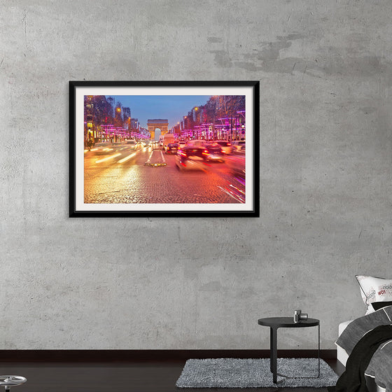 "Night view of Arc de Triomphe with vehicle light trails effect"