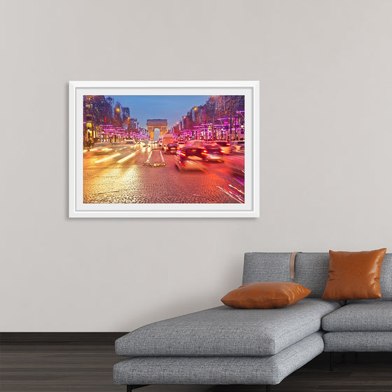 "Night view of Arc de Triomphe with vehicle light trails effect"