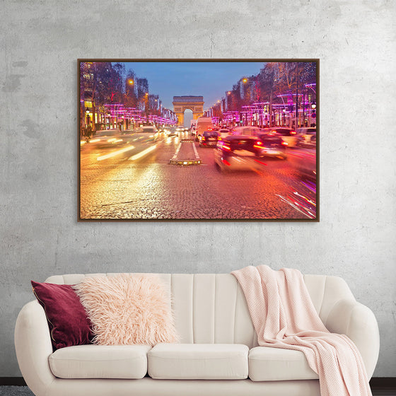 "Night view of Arc de Triomphe with vehicle light trails effect"