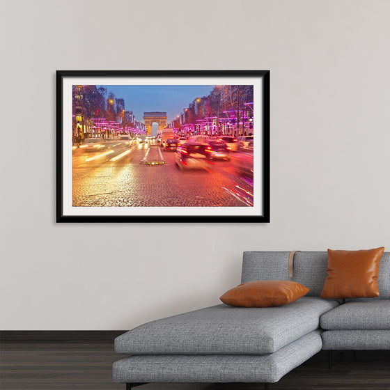 "Night view of Arc de Triomphe with vehicle light trails effect"