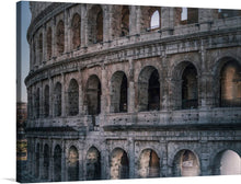  “Colosseum, Roma, Italy” is a stunning print of the iconic Colosseum in Rome, Italy. This print captures the grandeur and history of the ancient amphitheater, making it a perfect addition to any art collection. The image is taken from a low angle, capturing the grandeur of the structure. 