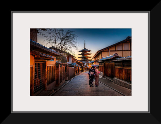 "Women exploring a japanese village in yukata"