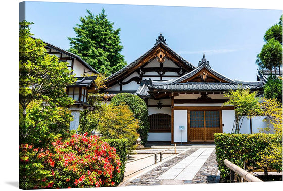 This exquisite print captures the serene beauty of a traditional Japanese architecture nestled amidst nature’s embrace. The artwork delineates a meticulously crafted structure, boasting intricate wooden designs and elegant roofing that speaks volumes of artistry and craftsmanship. Surrounded by lush greenery and vibrant flowers, the scene is a harmonious blend of man-made art and natural beauty.