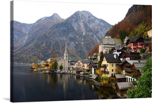  Immerse yourself in the serene beauty of this exquisite print capturing the idyllic village of Hallstatt, nestled against the pristine waters of Lake Hallstatt. This artwork encapsulates the harmonious blend of nature and architecture, where charming homes adorned with wooden balconies are juxtaposed against the majestic backdrop of alpine mountains.