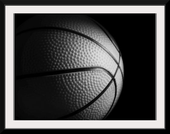 "Close Up of a Basketball in Black and White"