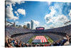 “Carolina Panthers’ Military Appreciation football game” is a beautiful print that captures the excitement and energy of the event. The image showcases the American flag being unfurled on the field, the packed stadium, and the beautiful skyline. 