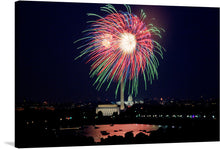  “July 4th Fireworks, Washington, D.C.” is a breathtaking artwork that captures the iconic celebration of Independence Day. The artwork features a mesmerizing view of July 4th fireworks in Washington, D.C., with two prominent bursts of fireworks visible in vibrant colors like red, green, blue, and white. 