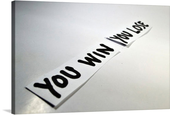 This artwork, titled “The Dual Path,” is a striking representation of life’s dichotomies. The print features two bold statements: “YOU WIN” and “YOU LOSE,” each written in black typography against a stark white background. The juxtaposition of these phrases serves as a powerful reminder of life’s inevitable ups and downs. The artwork’s minimalist design and impactful message make it a compelling piece for any space.