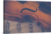 “Violin with Sheet Music”: Immerse yourself in the harmonious blend of music and artistry with our exclusive print. This exquisite piece captures the soulful elegance of a finely crafted violin, its rich wooden textures and curves gracefully juxtaposed against the structured beauty of musical notes on aged sheet music. Every line, every detail, is a sonnet; a visual melody that dances across the canvas, inviting viewers into a symphony of visual splendor. 