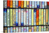 “Cassette Shop” is a colorful and nostalgic print that would make a great addition to any music lover’s collection. The print features rows of cassette tapes with various labels and colors, creating a visually engaging piece that is sure to spark conversation.