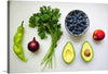  This artwork features an array of fresh produce, including a vibrant green chili, lush parsley, a red onion, ripe avocado, juicy peach, and a bowl of succulent blueberries, all set against a pristine white backdrop. 