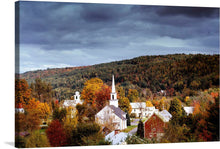  This beautiful print showcases a quaint New England town in the fall. The stunning colors of the trees and the picturesque church steeple make this a perfect addition to any home or office. The image is taken from a high vantage point, looking down on the town. 