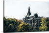 “Glasgow Cathedral in Scotland” is a breathtaking photograph that captures the grandeur of one of the oldest buildings in Glasgow. The Gothic-style cathedral, dating back to the 12th century, stands tall with its striking spire and intricate details. Surrounded by lush trees and foliage, the cathedral is a symbol of the city’s rich heritage. 