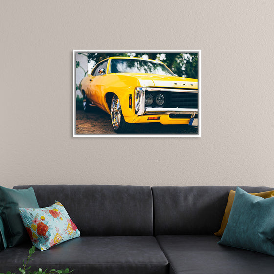 "Close Up of a Vintage Yellow American Car"