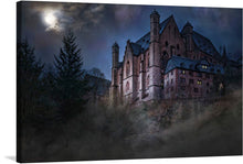  Immerse yourself in the enigmatic allure of this captivating print, “Eerie Elegance.” The artwork captures an old stone building, resembling a castle or mansion, bathed in the silvery glow of moonlight. The building’s multiple illuminated windows create a stark contrast with its dark exterior, while the surrounding bare trees add to its mysterious aura. A ghostly figure in the foreground enhances the supernatural theme. 