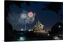  “Fireworks are seen from the U.S. Marine Corps Memorial area, in Arlington, VA on Jul. 4, 2013” is a stunning print that captures the beauty and excitement of the Fourth of July fireworks in Arlington, VA.