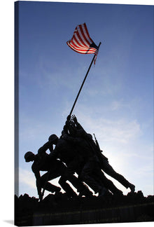  Capture the essence of bravery, unity, and patriotism with this striking art print. The silhouette of soldiers working together to raise the American flag is a timeless representation of camaraderie and national pride. Set against a backdrop of a clear blue sky, this piece serves as a reminder of the sacrifices made and victories won in the name of freedom.