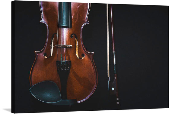 This beautiful print of a violin and bow is a perfect addition to any music lover’s collection. The rich colors and striking contrast make this piece stand out, while the close-up view of the instrument adds an intimate touch. The photo-realistic image showcases a rich brown violin with a glossy finish and a black bow with a silver tip and white hairs. 
