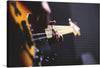 “Olsztyn, Poland” is a captivating print that immerses you in the soulful world of music. It features a close-up view of a musician’s hand skillfully playing a sleek, yellow electric guitar. The intimate atmosphere is enhanced by the soft yet focused lighting, highlighting the connection between the artist and their instrument. 