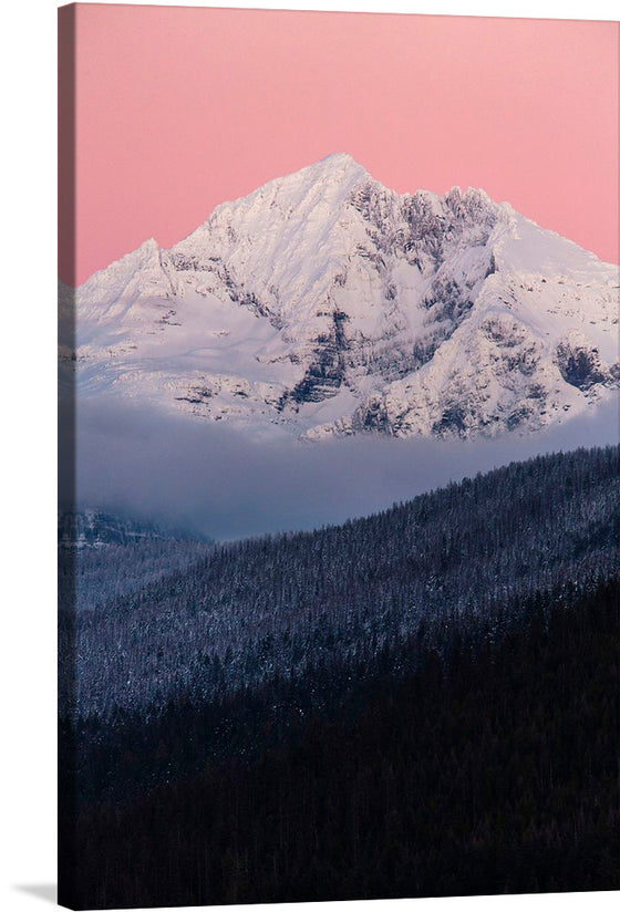 mmerse yourself in the serene beauty of “Gunsight Mountain Post Sunset,” a captivating print that encapsulates the tranquil yet majestic essence of nature. The artwork captures Gunsight Mountain, bathed in the soft afterglow of sunset, where the delicate pink hues dance gracefully against the pristine snow-capped peaks.